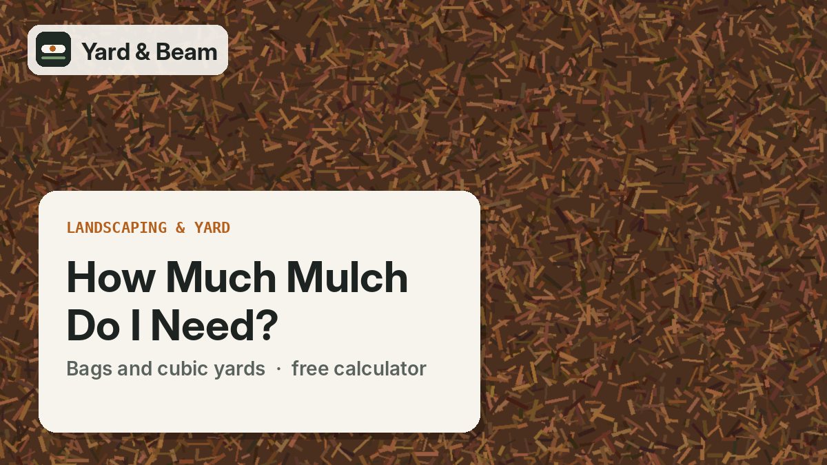 Garden bed covered with shredded bark mulch around a shrub, with a tape measure across it